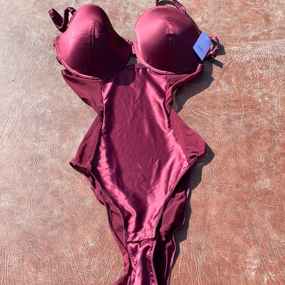 *New with tags* Super sexy burgundy body suit